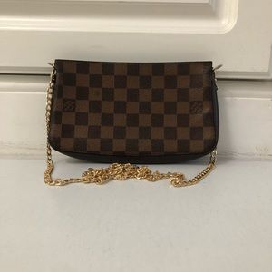 Authentic LOUIS VUITTON
Damier Canvas Navona Accessories Pochette Bag